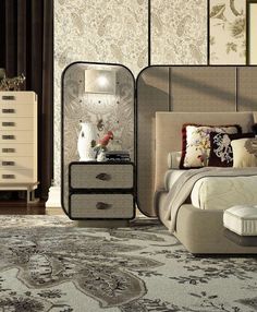 a bed room with a neatly made bed next to a night stand and chest of drawers