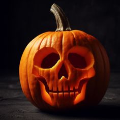 a carved pumpkin with a scary face on it's side, lit up in the dark