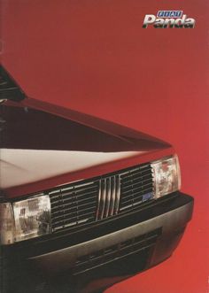 the front end of a red and white car with its hood up, on a red background