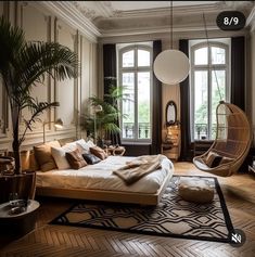 a large bed sitting in the middle of a living room