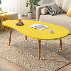 a yellow coffee table in the middle of a living room