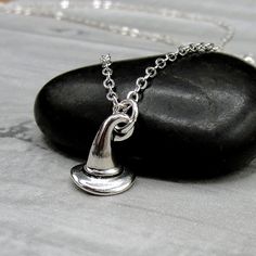 "This Witches Hat Charm necklace comes on a silver-plated chain that is available in different lengths. Please choose your desired length from the drop-down menu when placing the item in your shopping cart. { CHARM DETAILS } ★ Material: Pewter ★ Finish Color: Silver ★ Measurements: 3/8\" x 1/2\" ★ Dimensions: 3-Dimensional { SIMILAR ITEMS } More Halloween themed items available from my shop: https://www.etsy.com/shop/treasuredcharms/search?search_query=halloween { GIFT OPTIONS } Gift boxes are a Tiny Witch Hat, Wizard Hat, Witches Hat, Witch Hat, Halloween Gift, Fashion Jewelry Necklaces, Halloween Themes, Gift Boxes, Halloween Gifts