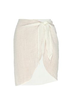 a women's white skirt with a tie around the waist