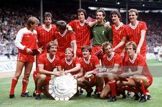 the liverpool united team pose with the fa cup after winning the european league in 1970