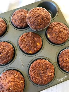 muffins in a cupcake pan ready to be baked into the oven for consumption