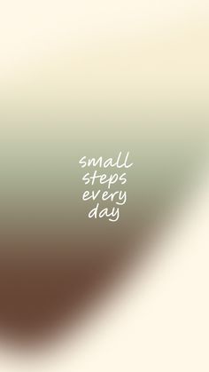 a blurry background with the words small steps every day written in white on it