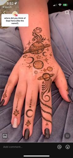 a woman's hand with henna tattoos on it and the words, what did you think of this?