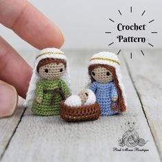 small crocheted nativity figurines are displayed