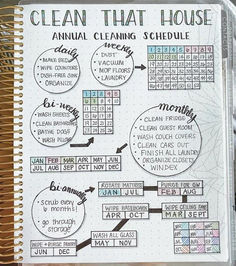 a spiral notebook with the words clean that house written on it