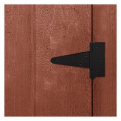 an image of a door handle on the side of a wooden door that is closed