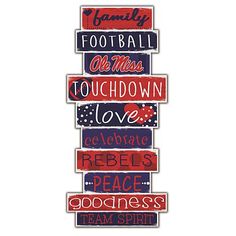 a wooden sign that says football all miss touchdown love and the words below it are red, white, and blue