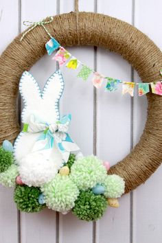 a spring wreath with an easter bunny on it