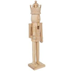 a wooden toy with a crown on it's head and hands in the shape of a man