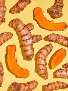 some very tasty looking food items on a yellow table top with orange peels