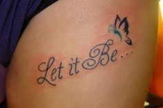 a tattoo saying let it be on the side of a woman's stomach with a butterfly