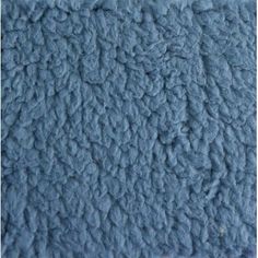 a close up view of the texture of a blue carpet