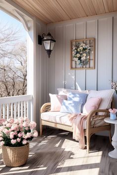 the porch is decorated with pink and white flowers