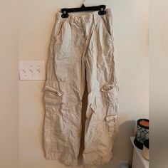 (See 2nd Photo For Measurements) Brand: Urban Outfitters Bdg Color: Off-White Size: Small Condition: Worn Only Once (No Stains/Rips) Y2k Ballon Light-Weight Cargo Pants Beige Cotton Y2k Style Bottoms, Casual White Parachute Pants, White Casual Full-length Parachute Pants, Casual White Full-length Parachute Pants, White Parachute Pants With Side Pockets, Y2k Style Beige Bottoms For Spring, White Y2k Pants With Pockets, Y2k White Pants With Pockets, White Cotton Y2k Style Pants