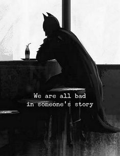 a batman sitting at a table in front of a window with the words, we are all bad in someone's story