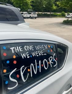 the back window of a car with writing on it that says, the one when we were seniors