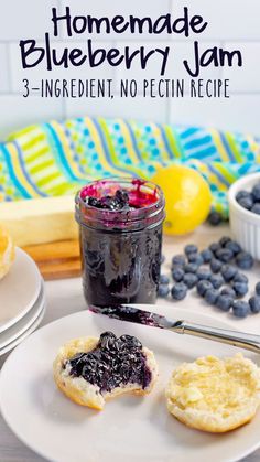 homemade blueberry jam on a white plate with lemons and blueberries in the background