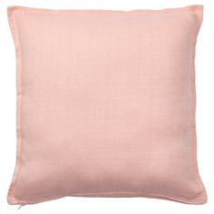 a pink pillow on a white background