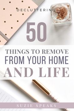 the words 50 things to remove from your home and life on top of a desk