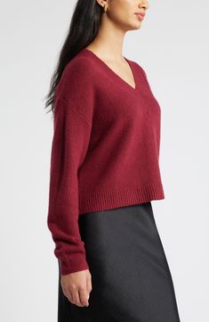 Amp up your cozy vibe in this slouchy V-neck designed with ribbed trim for a soft look and feel. 21" length (size medium) V-neck Long sleeves 40% nylon, 36% acrylic, 20% cotton, 4% spandex Hand wash, dry flat Imported Relaxed Fit V-neck Sweater For Fall, Cozy Fit V-neck Sweater, Red V-neck Sweater For Fall, Cozy Red V-neck Top, Casual Burgundy V-neck Sweater, Burgundy V-neck Top For Winter, Burgundy V-neck Sweater For Fall, Red Grape, Red Grapes