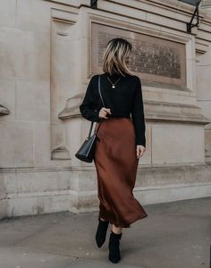 outfit ideas for fall with satin skirt Style Satin Dress Winter, Style Silk Dress Winter, Modest Silk Skirt Outfit, Brown Satin Skirt Outfit Winter, Style Midi Skirt Winter, Satin Skirt Autumn Outfit, Sweater Over Silk Dress, Satin Dress And Sweater, Quiet Luxury Fashion Fall