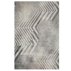 an area rug with grey and white designs on the side, in front of a white background