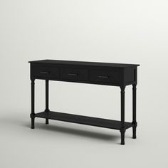 a black console table with two drawers on one side and an open drawer on the other