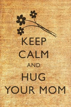 the words keep calm and hug your mom on burlocked fabric with black flowers