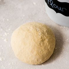 a ball of dough sitting on top of a table