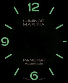 the watch face is glowing green in the dark