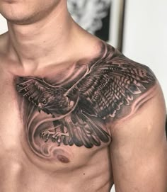 a man with an eagle tattoo on his chest