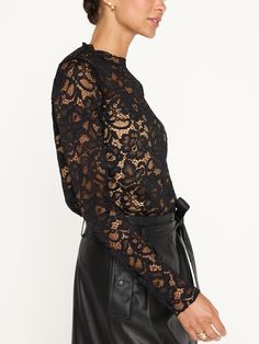 Our lightweight, Donne Floral Lace Top is the ultimate dress-up, dress-down layering piece. Featuring an attached, contrast camisole underlayer, this high crewneck top with a low-cut cami underlayer is as versatile as it is sensual. The stitched edge details on the neckline add a beautiful finishing touch, while spandex adds a level of comfort you expect from Brochu Walker. Feminine Color Palette, Brochu Walker, Floral Lace Top, Cold Fits, Floral Lace Tops, Skirt Belt, Black Lace Tops, Favorite Sweater, Off Black