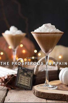 the propperious pumpkin cocktail is served in coupe glasses with whipped cream on top