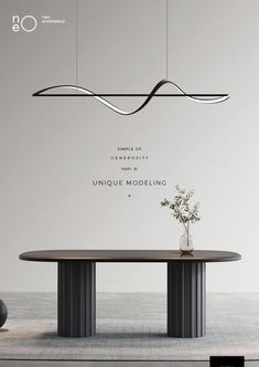 an image of a table with a vase on it and some lights hanging from the ceiling