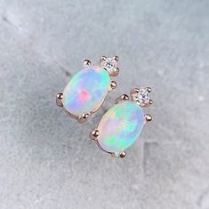 Welcome to Elegant Art Jewelry!  Material: 925 Sterling Silver Stone: Natural Opal Stone Size: 8mmx6mm Side Stone: Zircon Stone Cut: Cabution Oval Personalization: 9K/14K/24K/GOLD/SILVER/PLATINUM/ROSE-GOLD/WHITE GOLD. (Contact me)  Opal Earrings, Opal Cuff Earrings, Gold Earrings, Gold Stud Earrings, 14k Gold Earrings, 14k Gold Earrings, Round Cut Earrings, Round Cut Stone Earrings, Round Cut Studs Earrings, Opal Drop Earrings, Opal Studs Earrings, Opal Studs, Opal Earrings, Opal Dangle Earrins, Opal Jewelry Earrings, Opal Jewelry Set, Opal Jewellery, Emerald Earrings Drop, Opal Drop Earrings, Earrings Opal, Earrings Luxury, Cut Earrings, Womens Earrings Studs