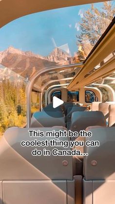 the inside of a bus with mountains and trees in the background that says, this might be the coolest thing you can do in canada