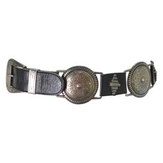 Introducing this timeless 1990s black leather belt, a must-have accessory that effortlessly combines vintage allure with contemporary flair. Adorned with a series of silver-tone buckles, each intricately engraved with geometric patterns, this belt exudes a sense of timeless style. The interplay of black leather and silver creates a perfect balance, offering a striking pop of silver that elevates any outfit. Unisex in design, this versatile belt is a seamless addition to any wardrobe, and its year-round appeal ensures it's always in vogue. Crafted for lasting quality, it's a true vintage gem that stands the test of time. In excellent vintage condition, this belt is ready to make a statement and become a staple in your collection. Style with some vintage Levi’s, a Moschino tee and a Dior han Luxury Vintage Belts And Suspenders With Antique Buckle, Leather Belt Patterns, Belts Aesthetic, Dior Handbags, Black Leather Belt, Vintage Belts, Leather Belts, Geometric Patterns, Vintage Levis