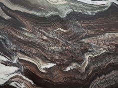 an abstract marble pattern in brown, white and black