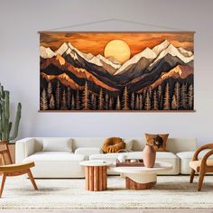 a living room filled with furniture and a painting on the wall