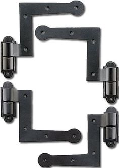 three black metal brackets on a white background