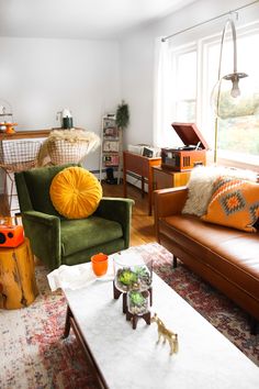 a living room filled with furniture and decor