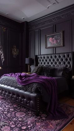 a bedroom with black walls, purple carpet and an upholstered bed in the middle