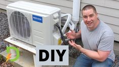 a man sitting next to an air conditioner with the words diy written on it