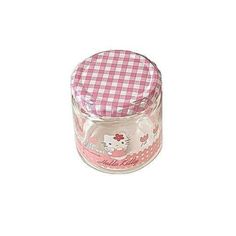 a hello kitty glass jar with pink gingham checker paper on the lid