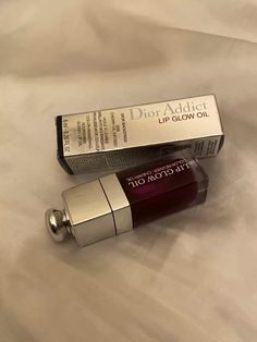 Dior Glow Lip Oil, Dior Lip Oil, Dior Lip Oil Raspberry Aesthetic, Dior Lip Products Aesthetic, Dior Lip Oil Aesthetic Coquette, Dior Makeup Aesthetic Products, Maroon Lipstick, Dior Lipgloss, Dior Addict Lip Glow