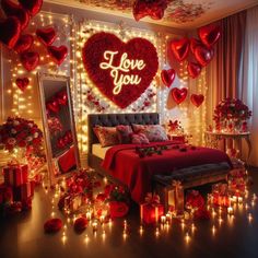 a bedroom decorated for valentine's day with lights and decorations